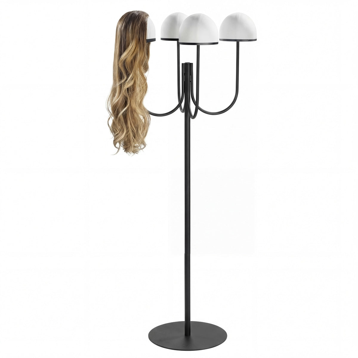 Four-head floor wig stand in black with a long wig on one head